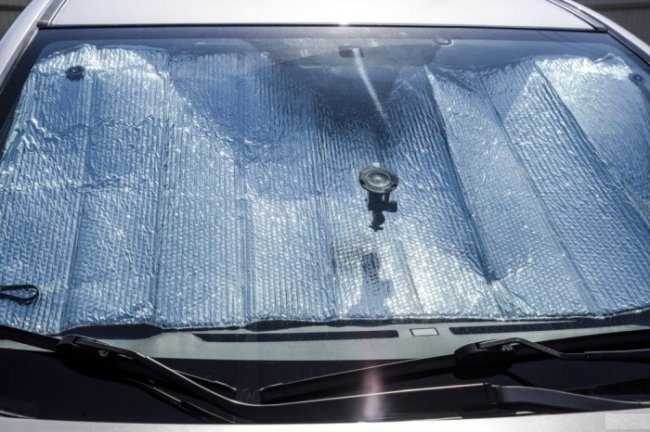 Простые способы уберечь автомобиль от палящего солнца летом (5 фото)